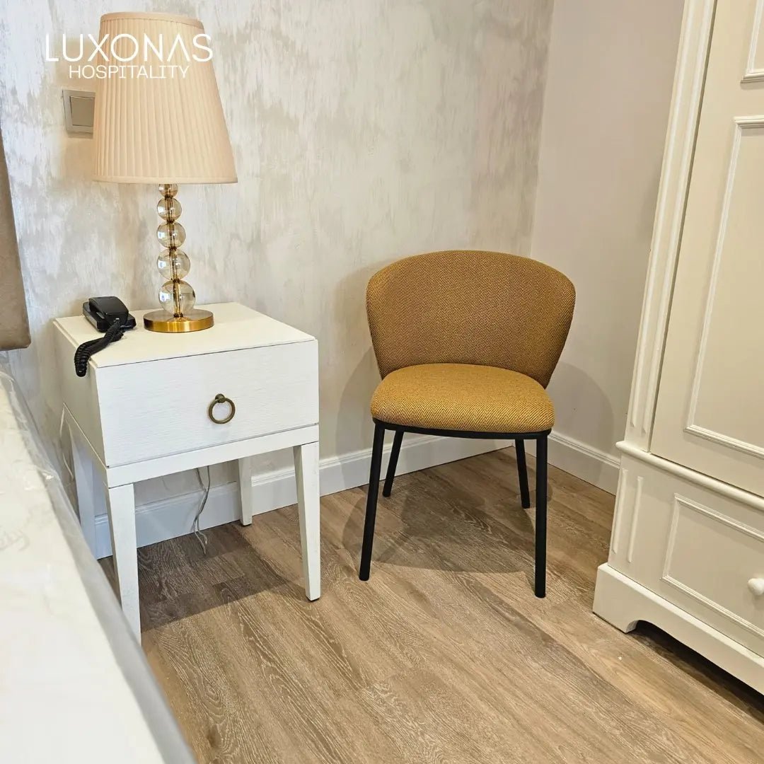 Osborne Hotel guest room bedside furniture and seating