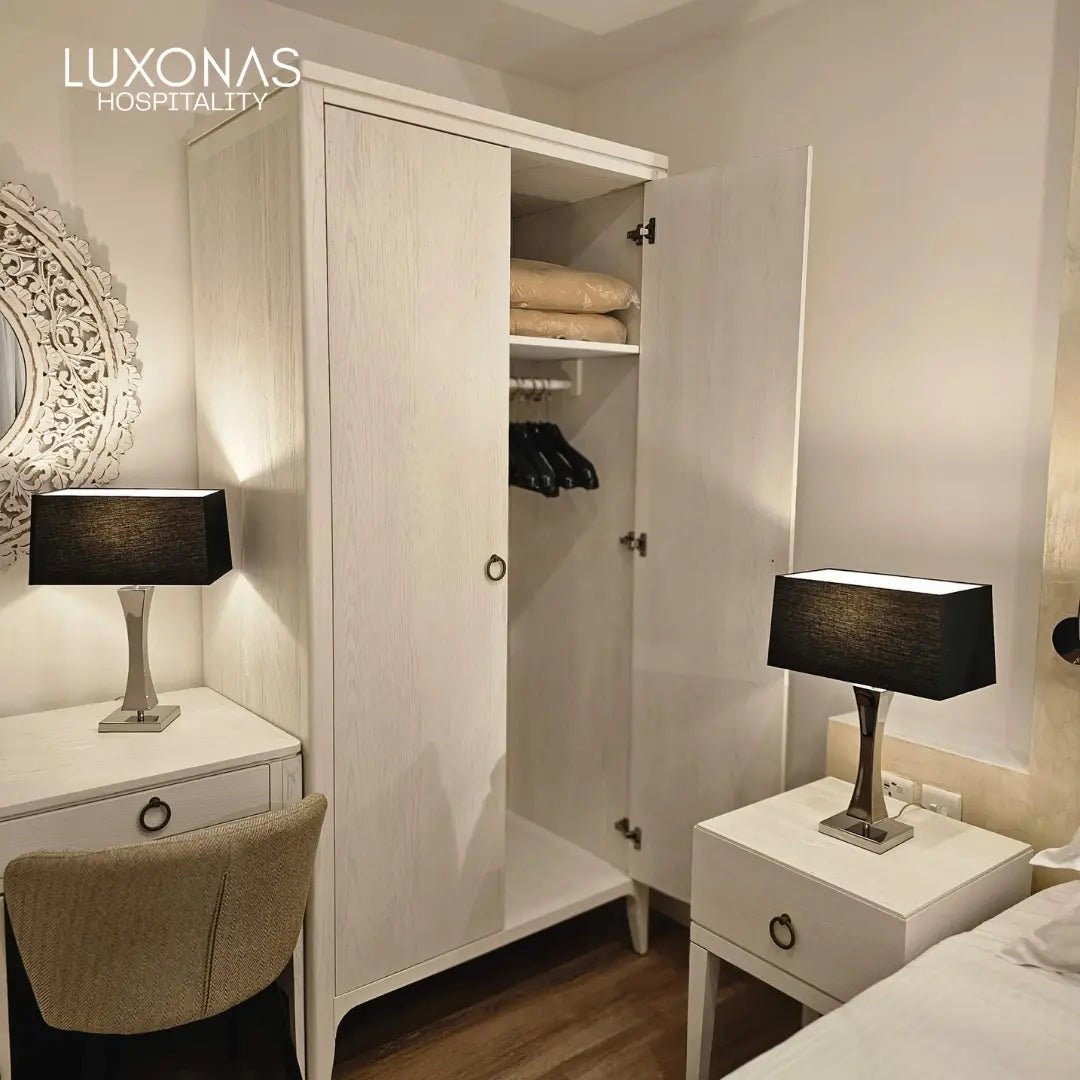 Osborne Hotel guest room wardrobe and bedside furniture